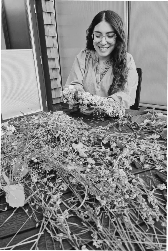 Katerina arranging wildflowers