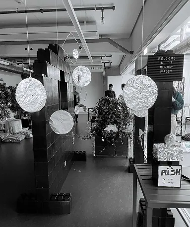 Black-and-white photograph of the digital development exhibition installation